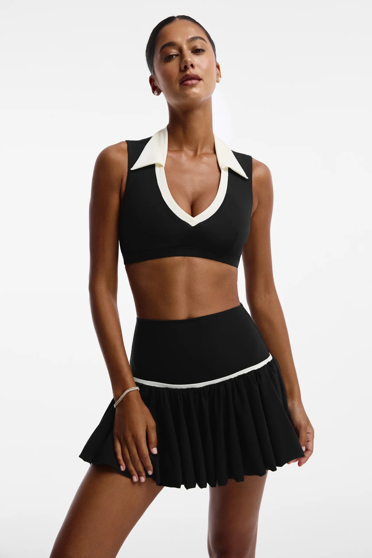 SUNSET POLO TOP BLACK