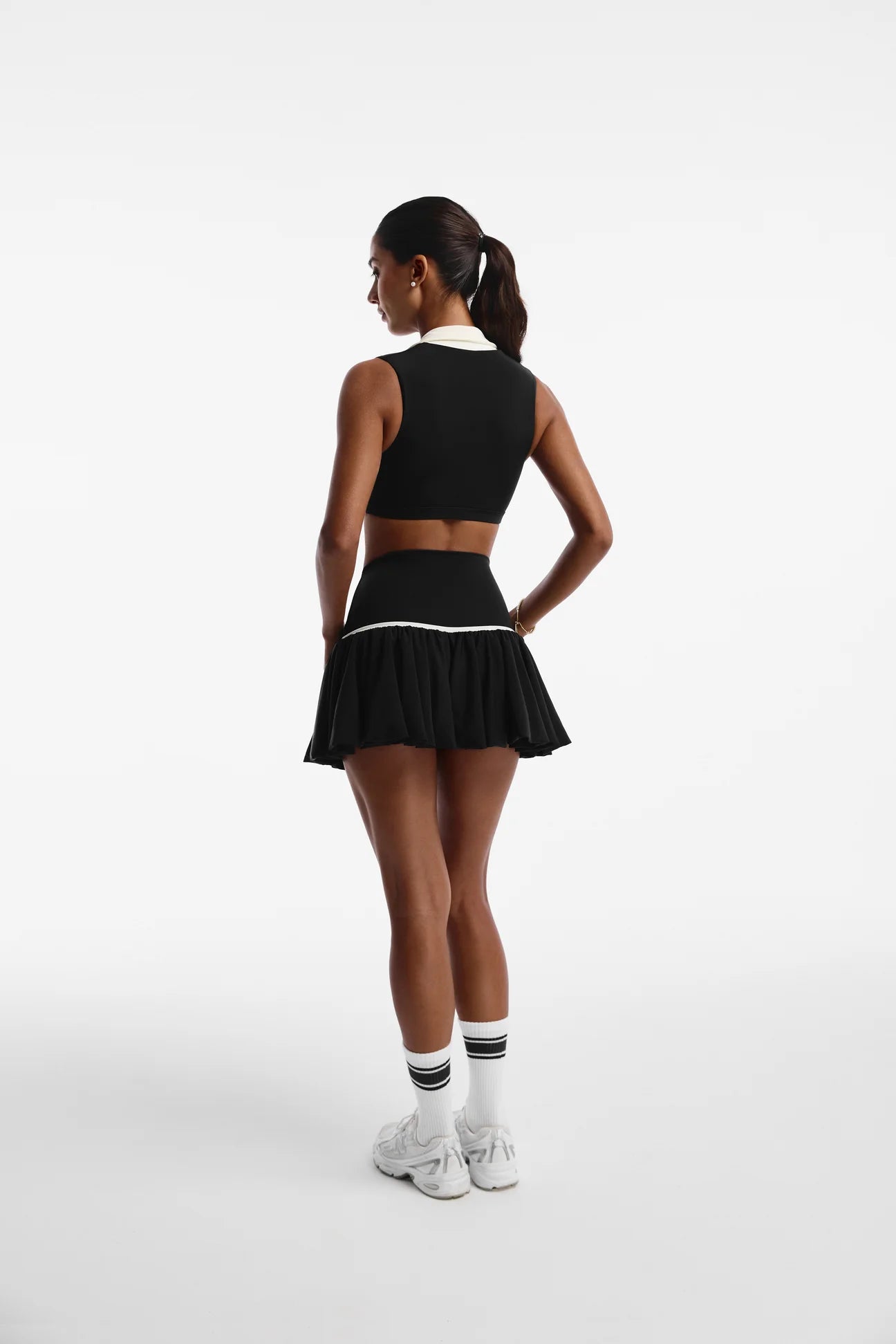 SUNSET POLO TOP BLACK